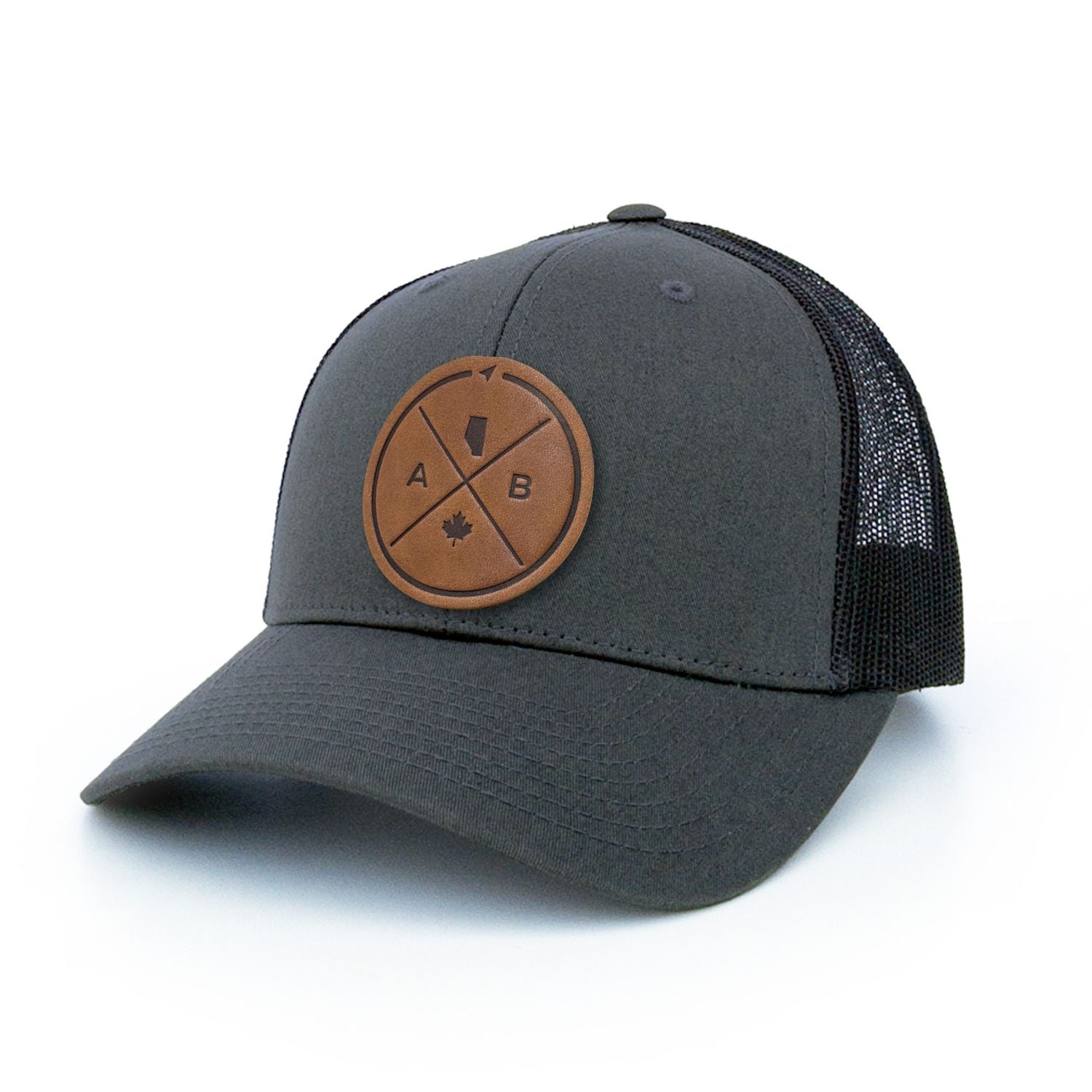 Charcoal trucker hat with full-grain leather patch of Alberta Compass | BLACK-002-020, CHARC-002-020, NAVY-002-020, HGREY-002-020, MOSS-002-020, BROWN-002-020