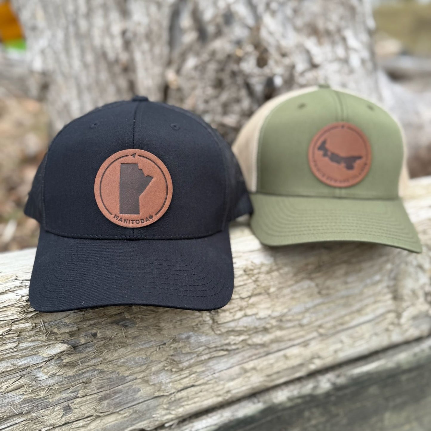 Black trucker hat with full-grain leather patch of Saskatchewan | BLACK-002-013, CHARC-002-013, NAVY-002-013, HGREY-002-013, MOSS-002-013, BROWN-002-013