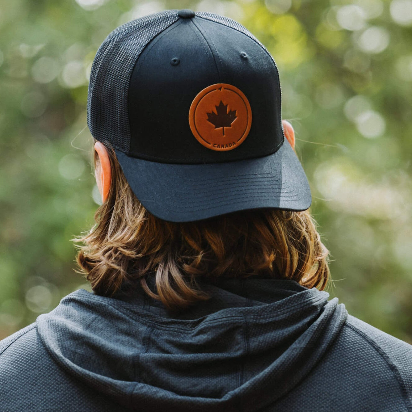 Black trucker hat with full-grain leather patch of Maple Leaf | BLACK-002-001, CHARC-002-001, NAVY-002-001, HGREY-002-001, MOSS-002-001, BROWN-002-001, RED-002-001
