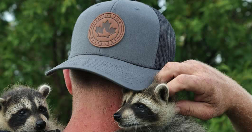 Custom Hats in Trucker Hat Style with heat-stamped company logo on a leather patch