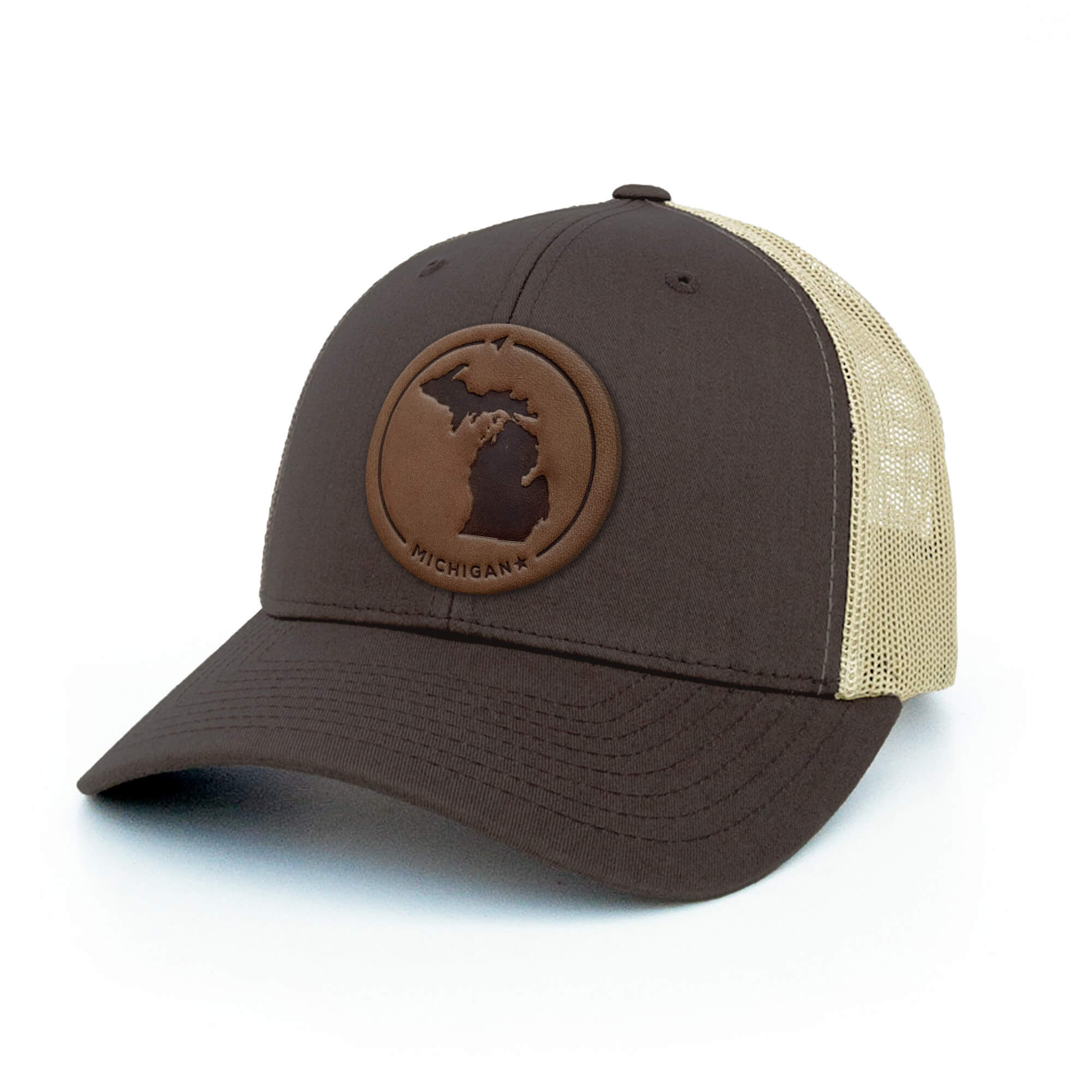 Brown and khaki trucker hat with full-grain leather patch of a Michigan | BLACK-003-007, CHARC-003-007, NAVY-003-007, HGREY-003-007, MOSS-003-007, BROWN-003-007