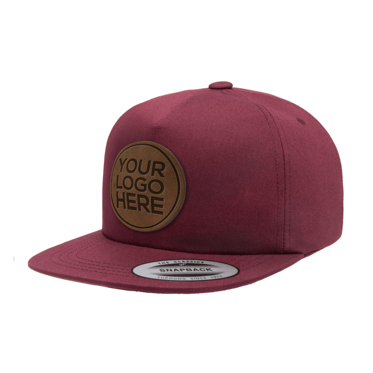 Custom leather patch flat brim hat with "Your Logo Here" patch on white background