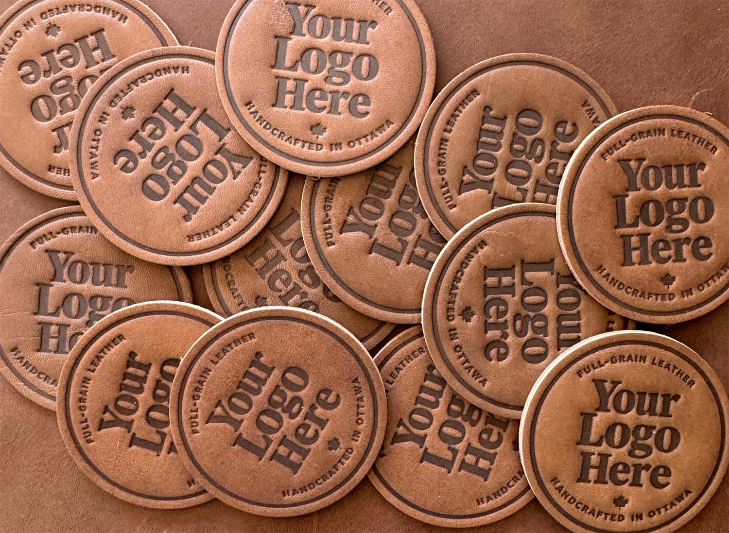 full-grain leather patches with heat stamped your logo here text