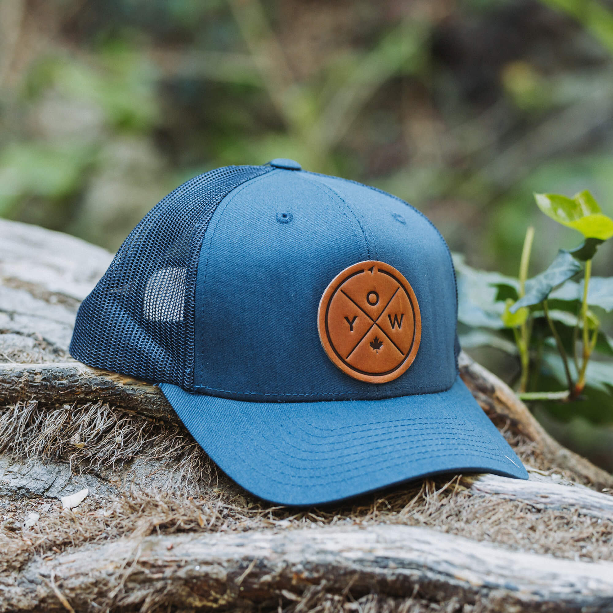 Navy trucker hat with full-grain leather patch with YOW embossing | BLACK-002-008, CHARC-002-008, NAVY-002-008, HGREY-002-008, MOSS-002-008, BROWN-002-008
