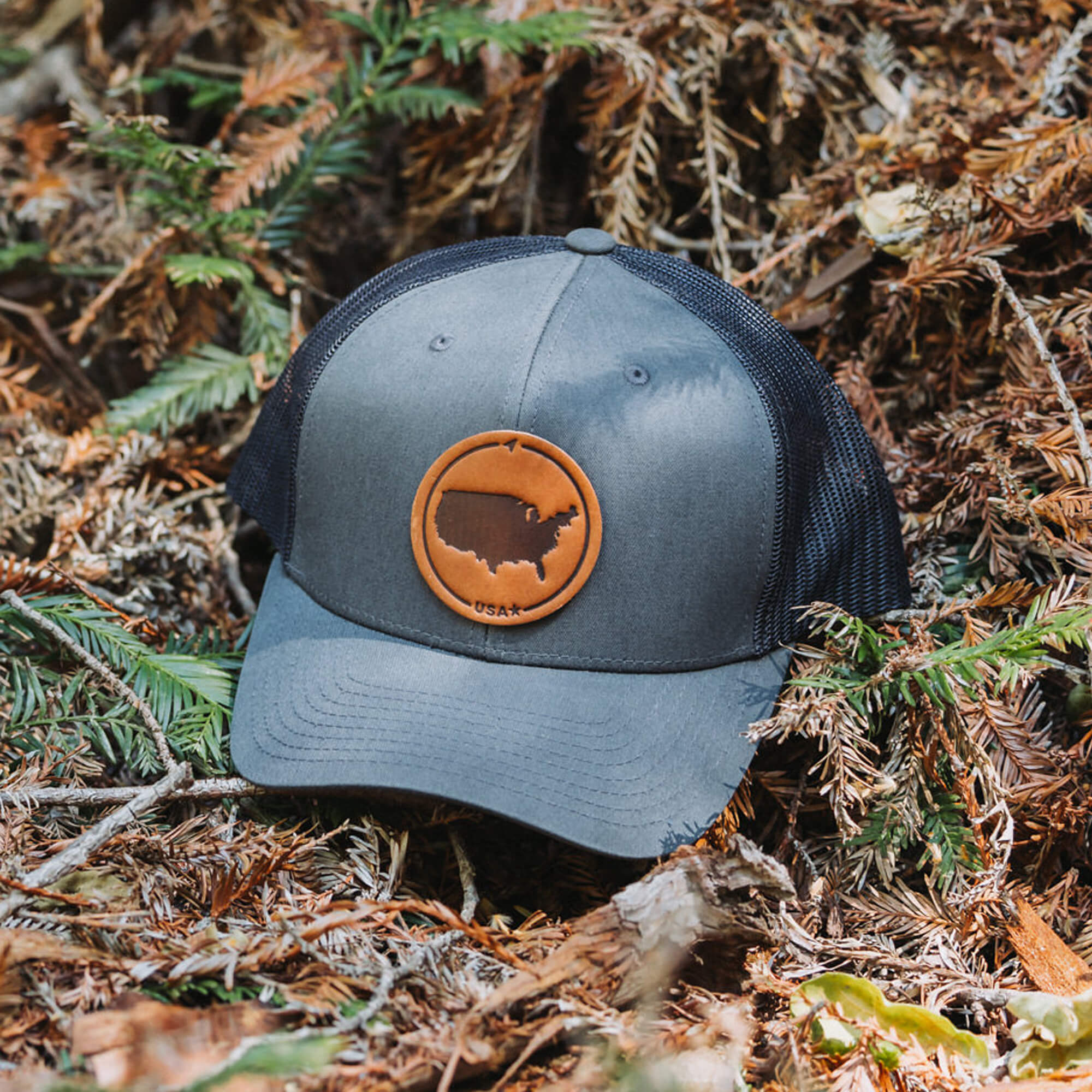 Charcoal trucker hat with full-grain leather patch of USA | BLACK-003-001, CHARC-003-001, NAVY-003-001, HGREY-003-001, MOSS-003-001, BROWN-003-001
